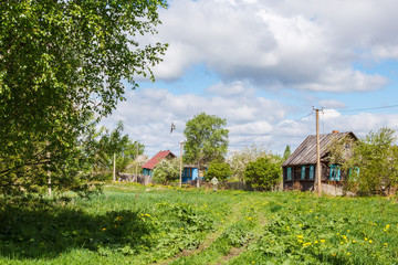 Obraz premium Entrance to the village in summer