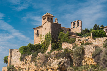 Fototapeta premium A view of the ancient castle from the beach Tamarit