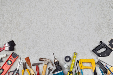 Top view of  work tools on cement board with copy space