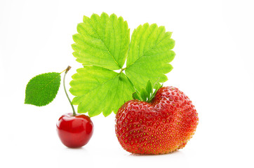 Fresh, ripe, juicy and mouth-watering strawberries with green leaves