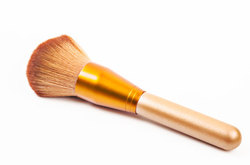 Makeup gold brush powder.