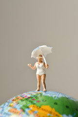 miniature woman in swimsuit