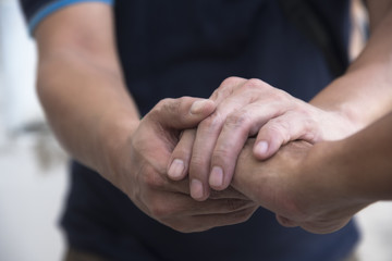 A man giving hand for sympathy