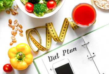 concept diet, slimming plan with vegetables top view mock up