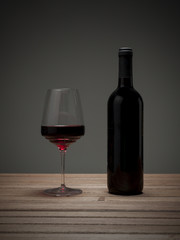 Red wine in bottle and glass