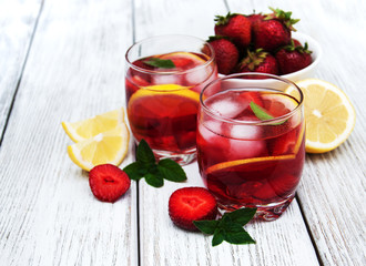 Glasses of lemonade with strawberries
