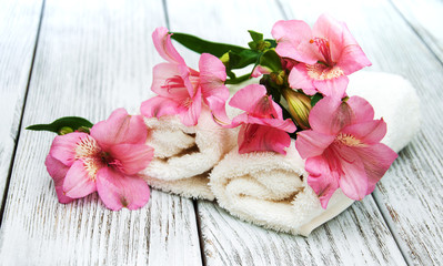 Spa towels and alstroemeria flowers
