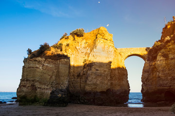 The Praia da Batata bridge at sunset in Lagos, Portugal