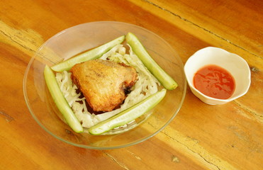 fried chicken thigh dressing salt and pepper dipping with chili sauce 