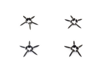 4 stars laid out with black screws on white background
