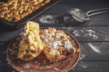 Rustic style pie iced with sugar powder