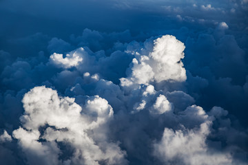 Naklejka na ściany i meble White clouds, view from above air plane window