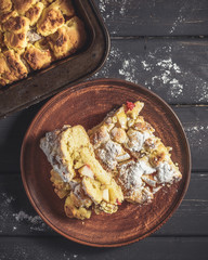 Rustic style pie iced with sugar powder