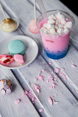 bubble tea in pink and blue color in a plastic Cup with a straw. Soft,beautiful colors