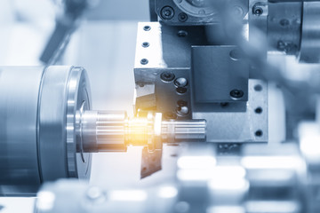 CNC lathe machine (Turning machine) while cutting the aluminium screw thread.Hi-precision CNC...