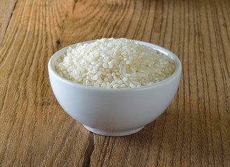 japanese rice on wooden background