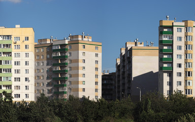 panorama city view of buildings on blue sky background