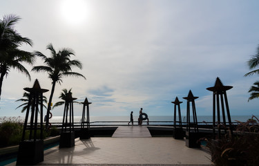 Group of diverse walking by the swimming pool