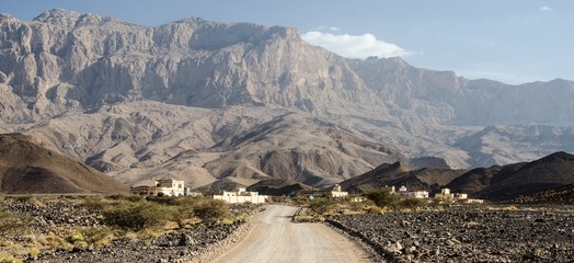 Panoramic view of a winding trail in middle of a desert landscape