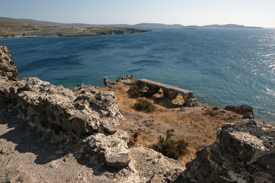uin of a castle at Dry and withered landscape at Lesbos Greece at the coast. Mediterranean Sea