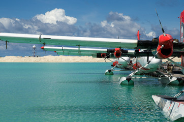 Sea planes ready to board in the sea
