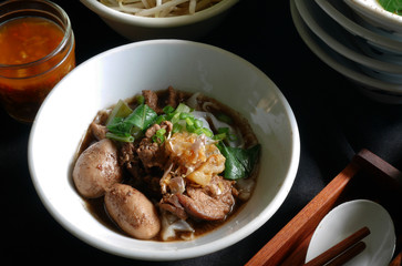 Thai noodle blood soup with pork and pork balls, delicious boat noodle, boat noodle