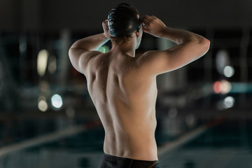 Rear view of a male swimmer