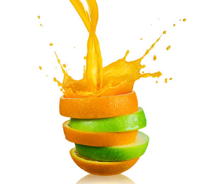 green apple and splashing orange juice