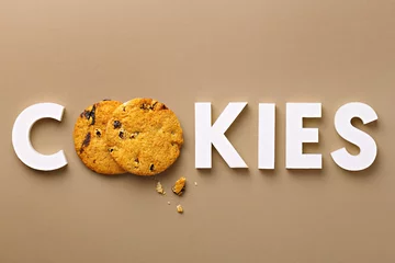 Poster Cookies. Fresh cookies and white letters. Top view. Copy space. © virtustudio