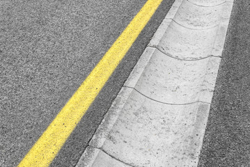 Fototapeta premium Drain channel on the asphalt road.
