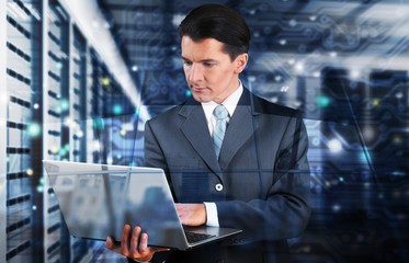 Fototapeta premium Business man on digital background.
