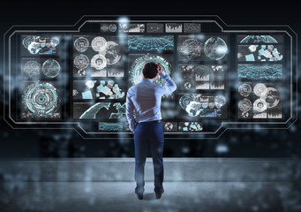 Businessman watching graph screens interface on a rooftop 3D rendering