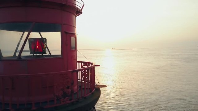 Flying away from a lighthouse