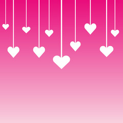 Hanging Valentine's heart on pink background