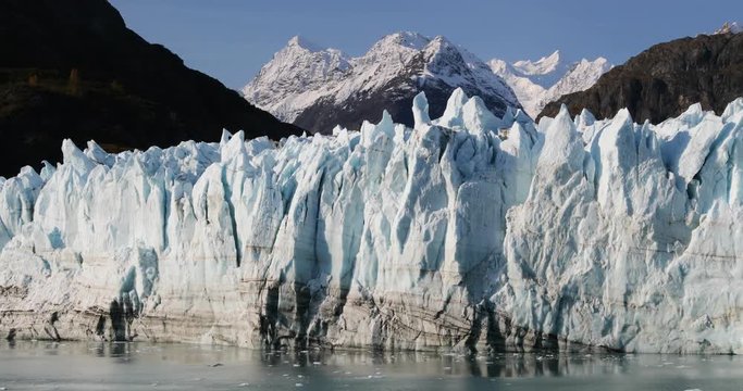 Glacier melting. Global warming and climate change concept. Alaska Glacier Bay landscape with Margerie Glacier and Mount Fairweather Range mountains in amazing Glacier Bay nature, Alaska