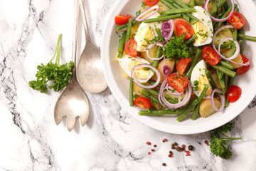 vegetable salad with potato,egg,bean and tomato