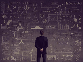 Businessman standing over schematic background. Business and office, concept.