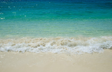 Fototapeta na wymiar The beach with turquoise sea in tropical island
