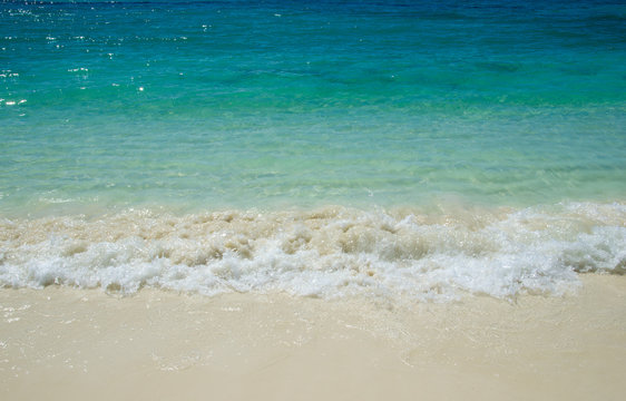 The beach with turquoise sea in tropical island