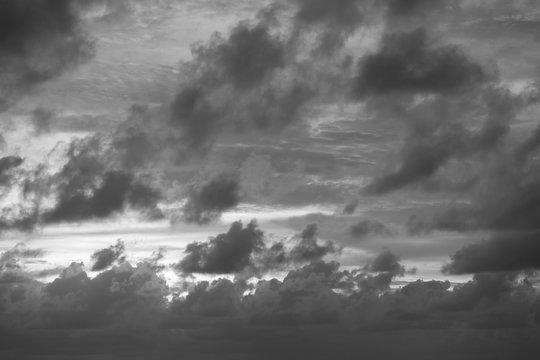 Dramatic clouds at sunset - black and white