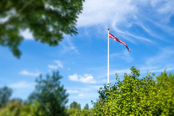 Danish pennant on a white flagpole © Polarpx