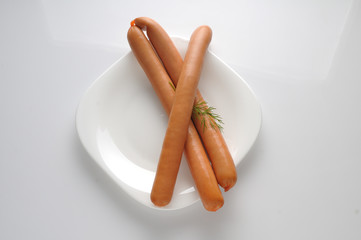 Sausages on a white background