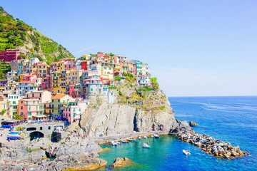 Fototapeta na wymiar Stunning view of the beautiful and cozy village of Manarola in the Cinque Terre Reserve. Liguria region of Italy.