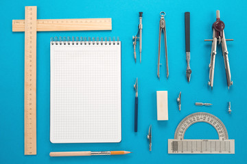 Drawing tools on a blue background 