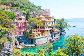 Beautiful sea coast with colorful houses in Portofino, Liguria, Italy. Summer stunning landscape.