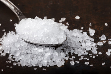 sea salt in stainless steel spoon