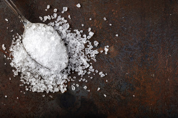 Sea salt in stainless steel spoon