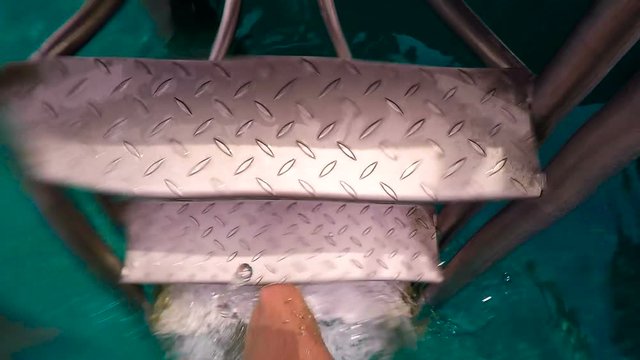  The guy comes out of the sea on the stairs, Slowmotion, HD footage, Turkey