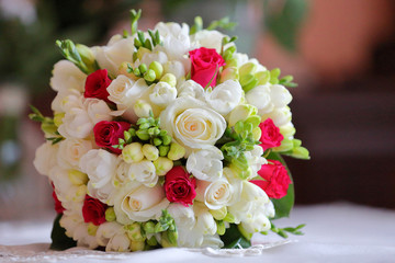 Wedding bouquet of red and white roses