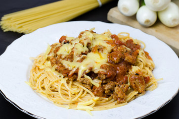 Italian spaghetti bolognese with tomato sauce, meat and cheese